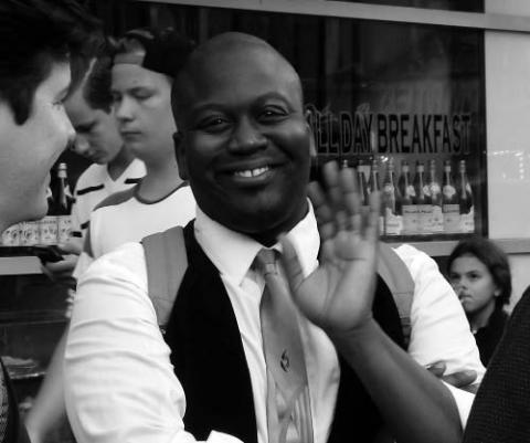 Titus Burgess gives FF a wave.